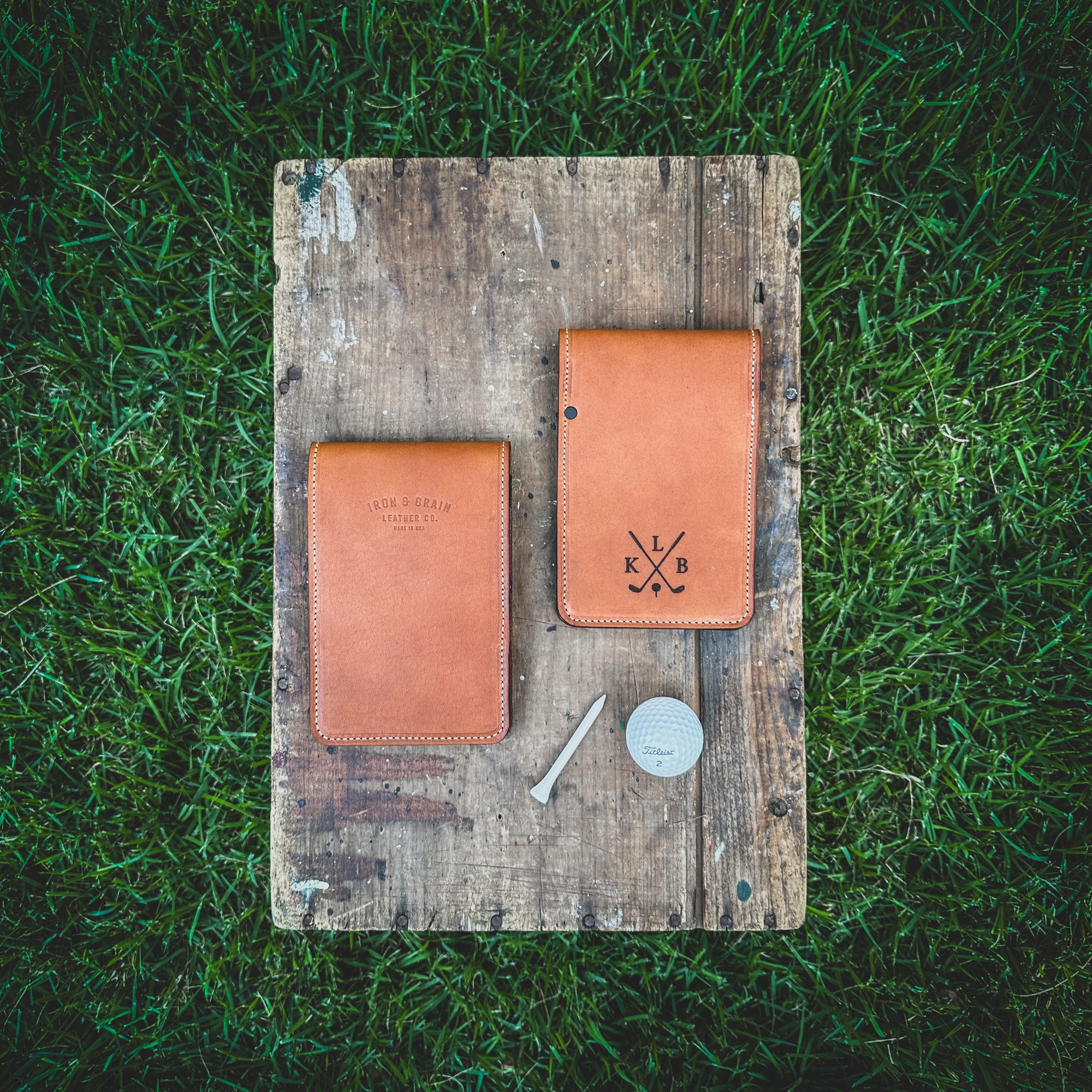 Level up your golf game with this yardage and scorecard book