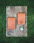 Level up your golf game with this yardage and scorecard book